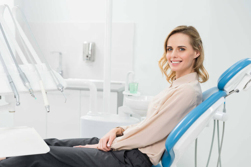 My Dentist at Morgan Creek - Smiling Woman on Dentist Chair