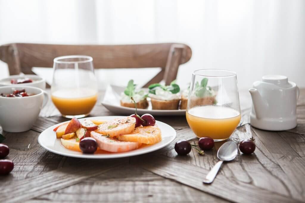 a table set with healthy food and drinks