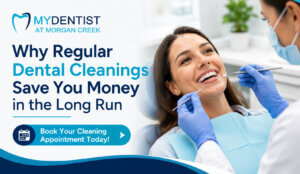 A professional horizontal promotional banner for My Dentist at Morgan Creek featuring a smiling female patient receiving a dental cleaning from a hygienist wearing blue gloves and a face mask. The design uses teal and navy blue brand colors with the My Dentist at Morgan Creek logo in the top left corner. Large bold text reads, “Why Regular Dental Cleanings Save You Money in the Long Run,” alongside a call-to-action button that says, “Book Your Cleaning Appointment Today!” The clean, modern layout is designed for a Google Business Profile post promoting preventive dental care in South Surrey and White Rock, BC.